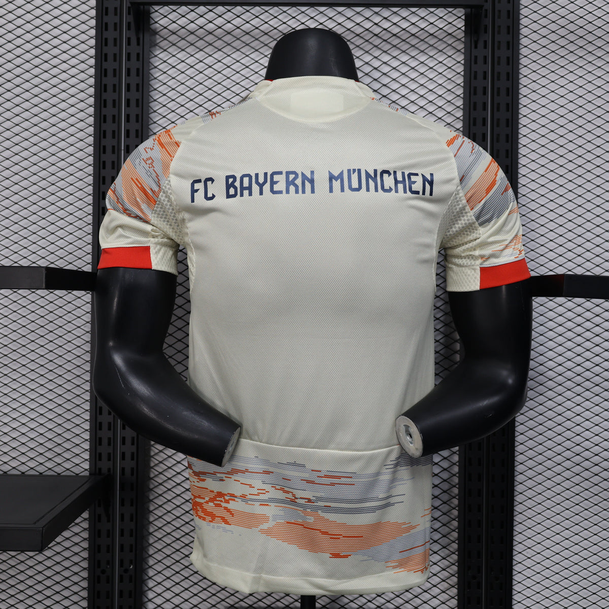 2025/26 Bayern Munich Away Player Version Jersey -  Body Orange Grey Horizontal Brush Stroke Graphic  - Red Side Seam Piping Red Sleeve Cuffs Black Shoulder Stripes - FC Bayern Crest - Deutsche Telekom T Logo