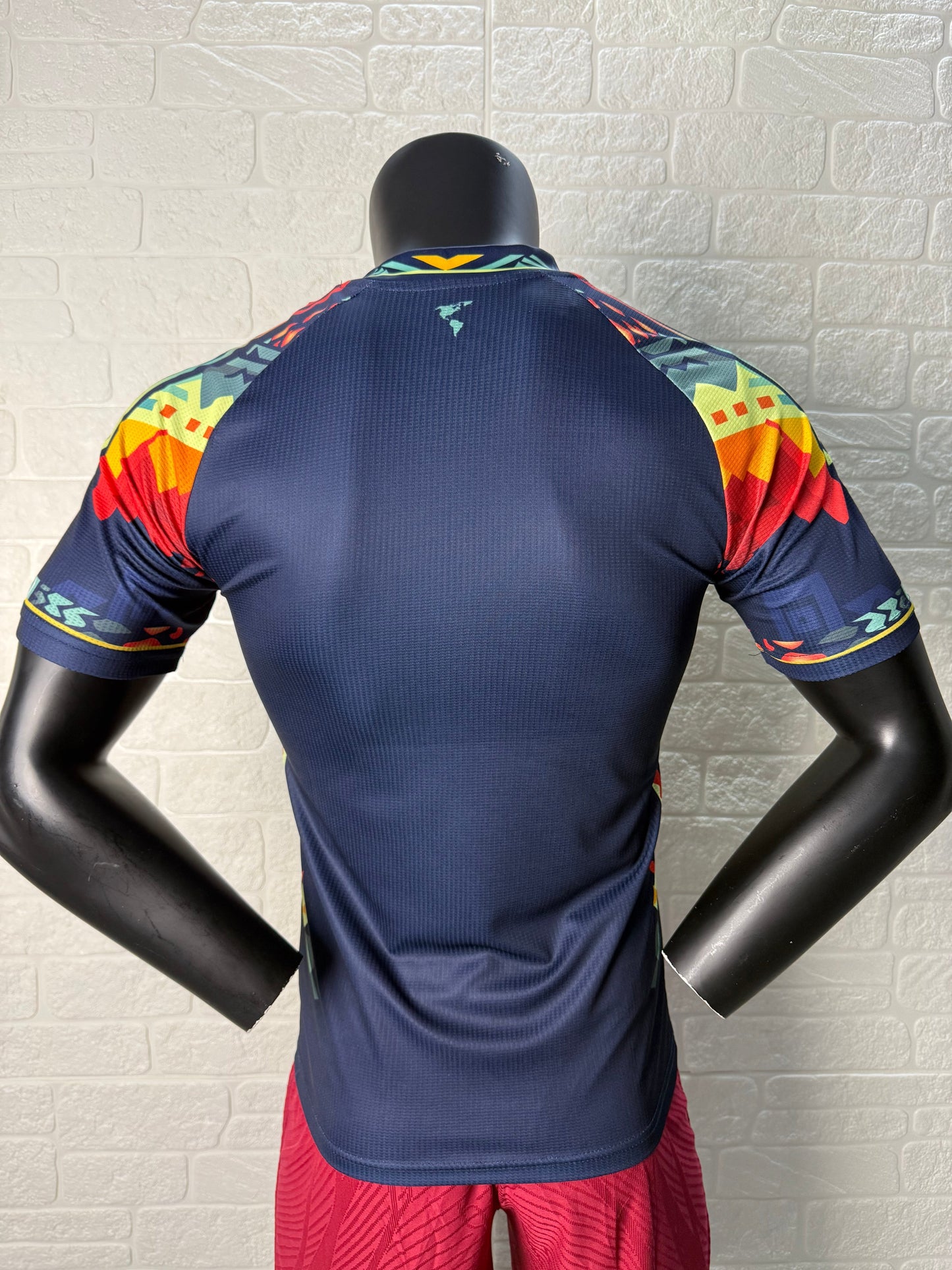 2025/26 Club América Training Player Version Jersey - Dark Navy Blue Body Multicolour Aztec Zigzag Graphic Upper Chest  - Gold Three Stripes - Club América Crest - Caliente Principal Sponsor