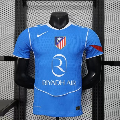 2025/26 Atlético de Madrid Second Away Player Version Jersey- Blue Body - White Trim V-Neck Collar - Red Shoulder Accent - White Nike Swoosh - Atlético Crest - Riyadh Air White Sponsor