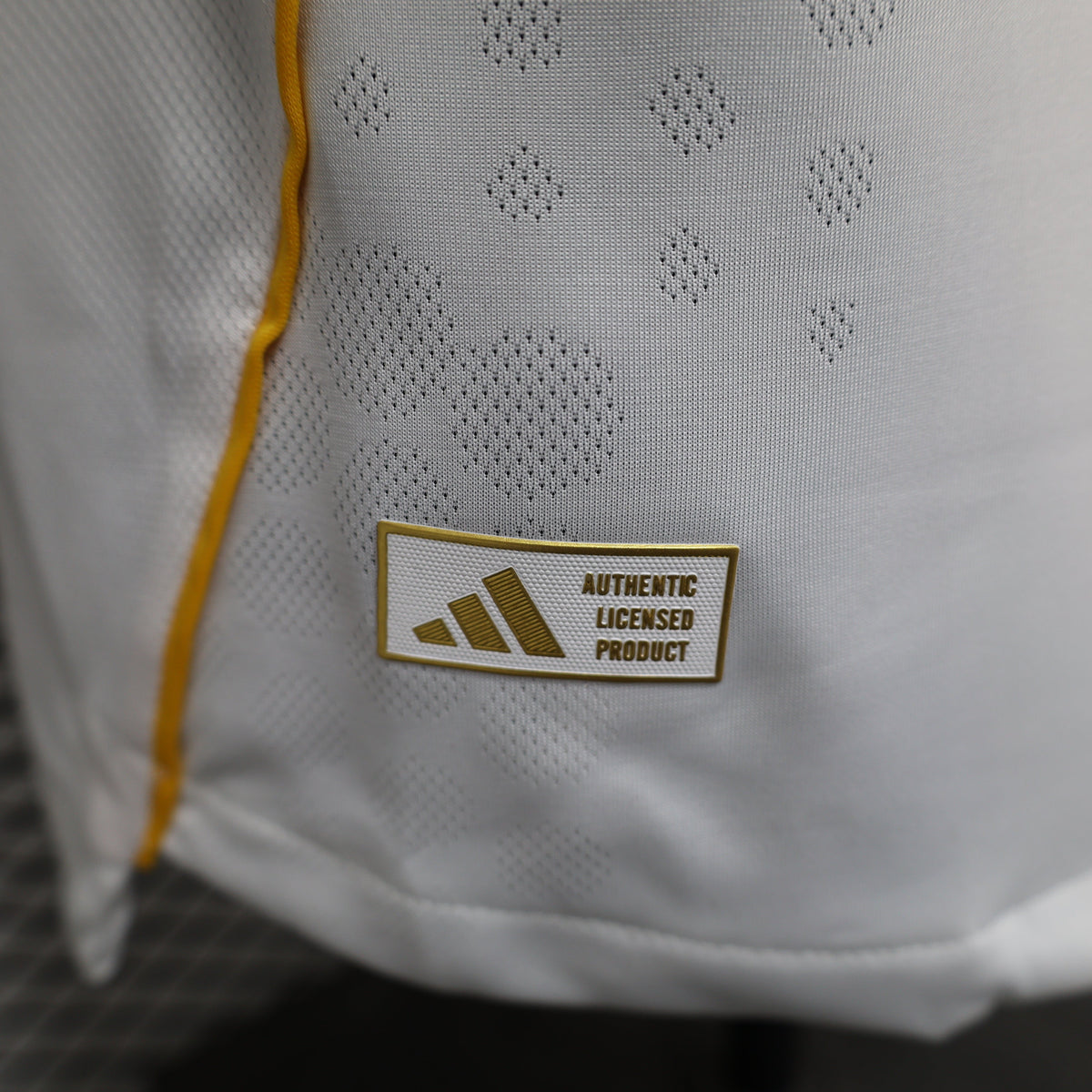 2025/26 Real Madrid Home Player Version Jersey -  White Grey Tonal Diamond Honeycomb Texture - Gold Yellow Side Seam Piping - Emirates Fly Better