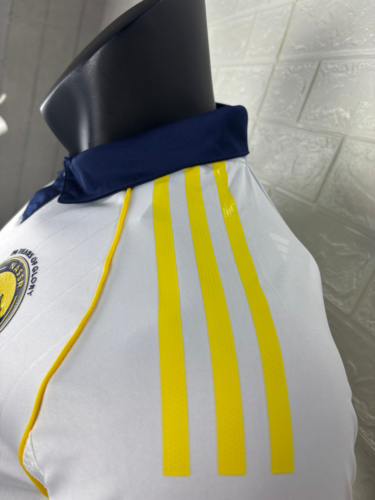 2025/26 Al-Nassr Away Player Version Jersey - White Body - Dark Navy Blue Polo Collar - Gold Yellow Side Seam Piping - KAFD Gold Yellow Sponsor