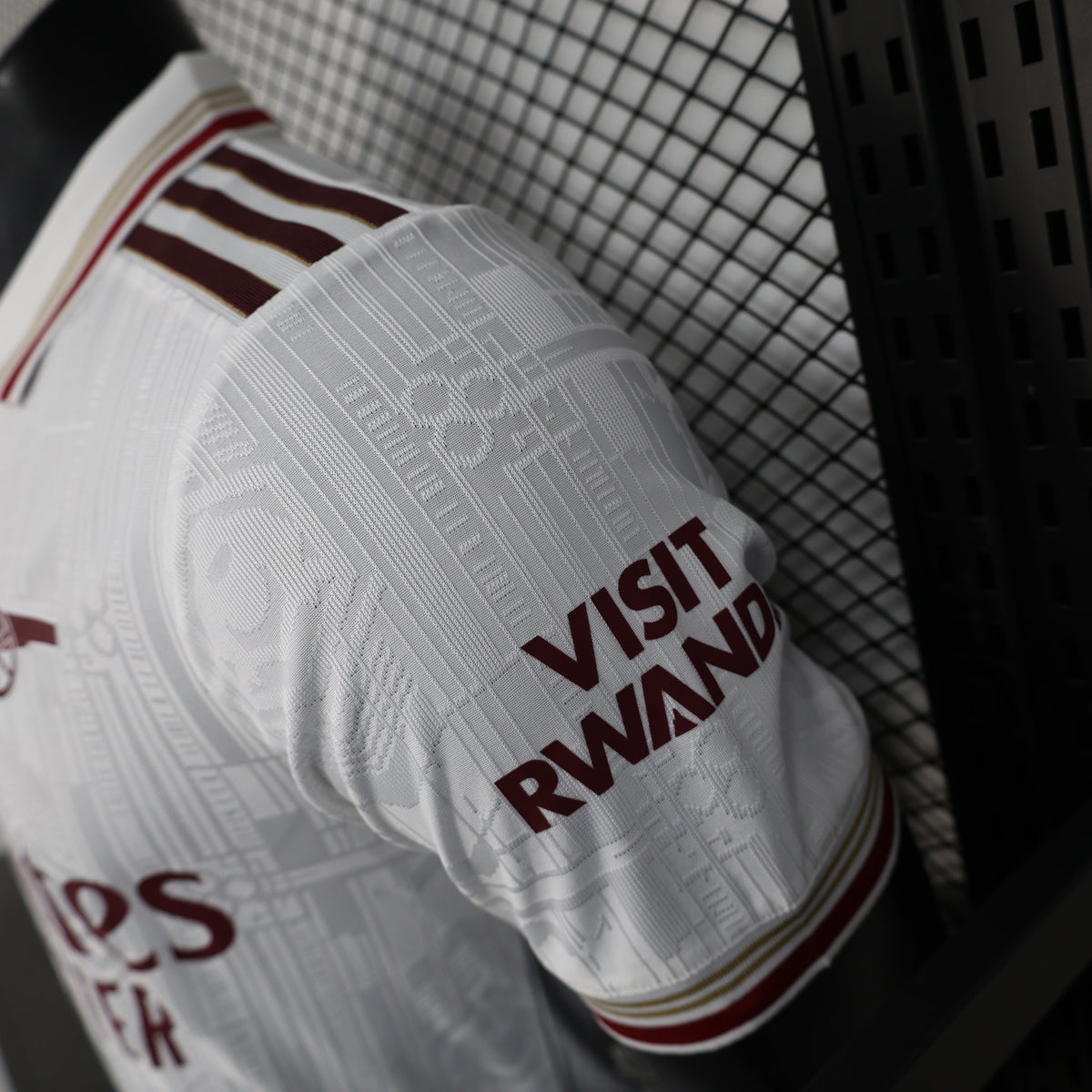 2025/26 Arsenal Away Player Version Jersey - White Body All-Over Subtle Tonal Graphic Texture Deep Maroon Polo Collar Multi-Stripe Gold Red White Trim - Originals Trefoil - Arsenal Cannon Crest - Emirates Fly Better - Men's