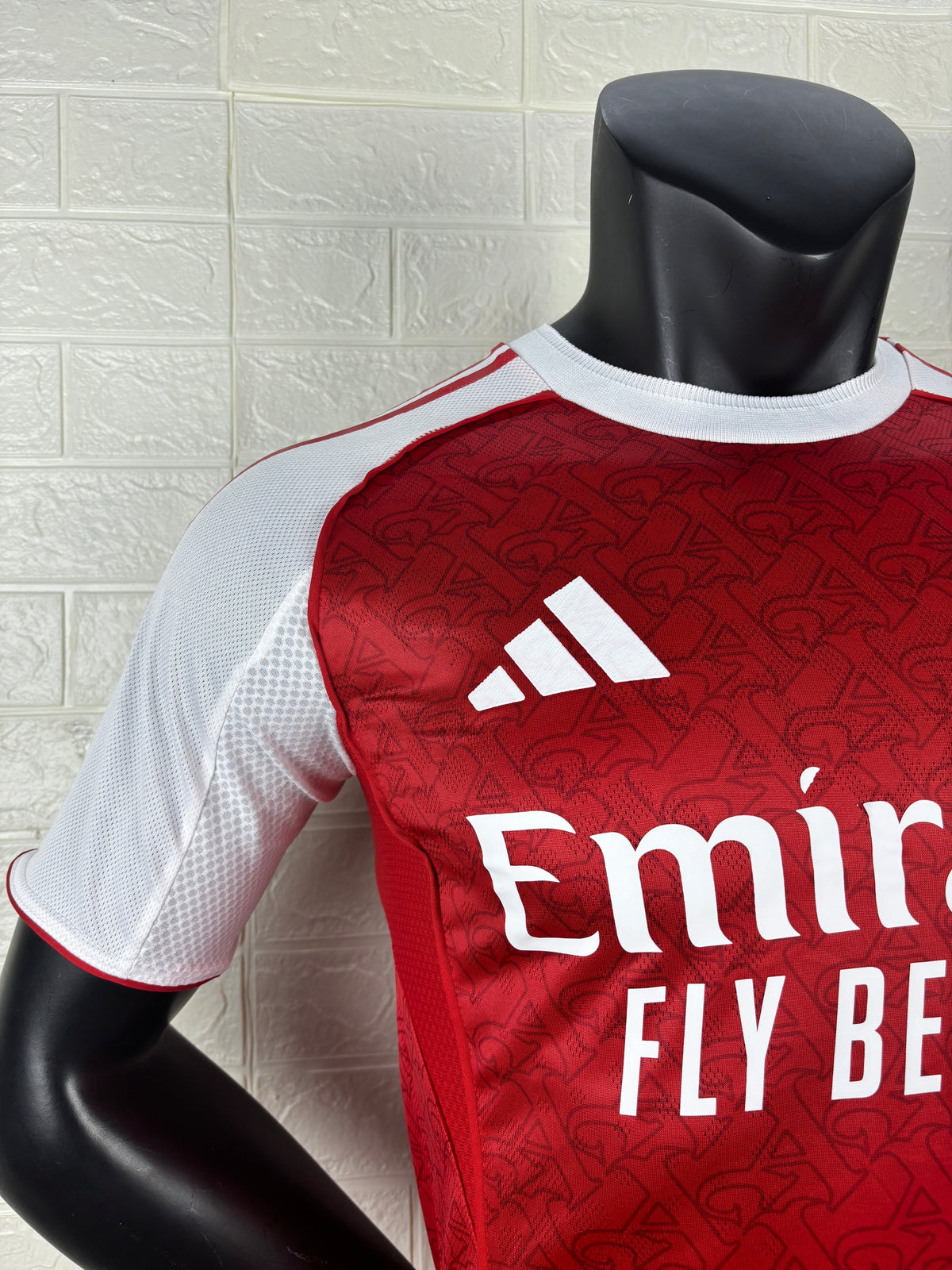 2025/26 Arsenal Home Player Version Jersey - Red Body White Sleeves Diamond Mesh Texture Red Side Seam Piping - White Three Stripes Left Chest - Arsenal Shield Crest Right Chest - Emirates Fly Better Principal Sponsor