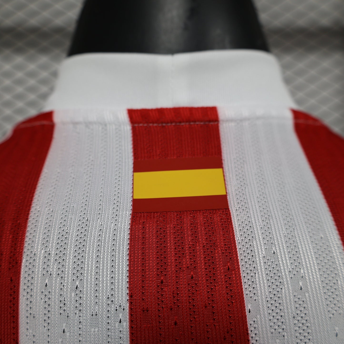 2025/26 Atlético de Madrid Home Player Version Jersey -  Red & White Vertical Wide Stripe - White V-Neck Collar - Blue Nike Swoosh - Atlético Crest - Riyadh Air Blue Sponsor