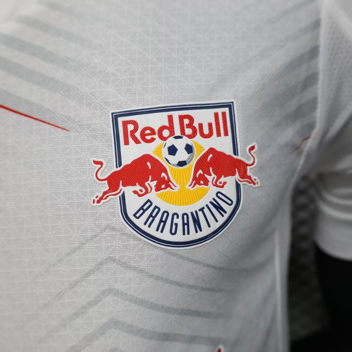 2025/26 RB Leipzig Home Player Version Jersey - White Red Geometric Arrow Chevron Pattern - Red Bull Double Bull Yellow Sun Crest