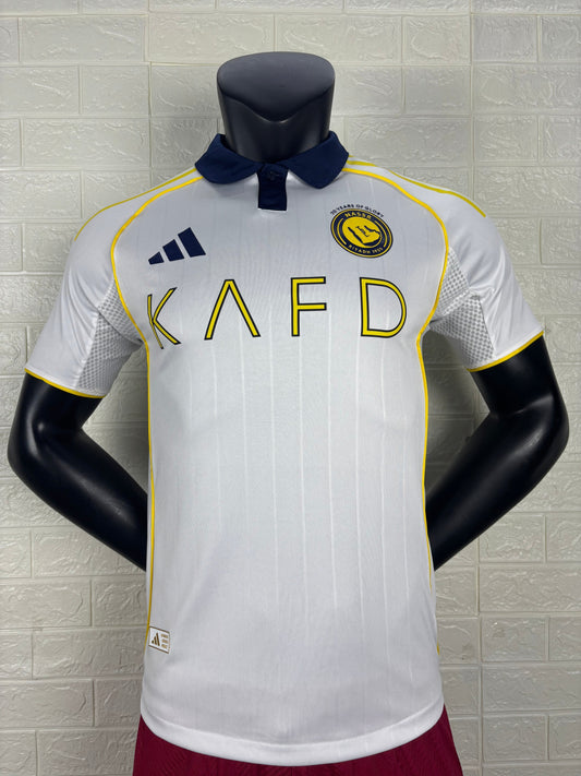 2025/26 Al-Nassr Away Player Version Jersey - White Body - Dark Navy Blue Polo Collar - Gold Yellow Side Seam Piping - KAFD Gold Yellow Sponsor