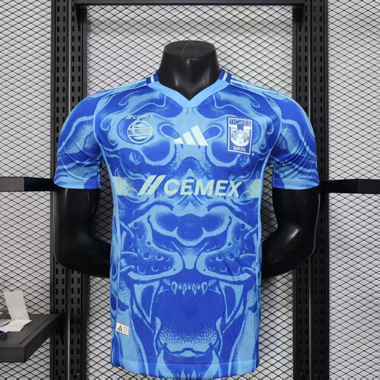 2025/26 Tigres UANL Away Player Version Jersey - Royal Blue Body - All-Over Tiger Face Tonal Graphic Print - Blue V-Neck Collar - CEMEX White Sponsor